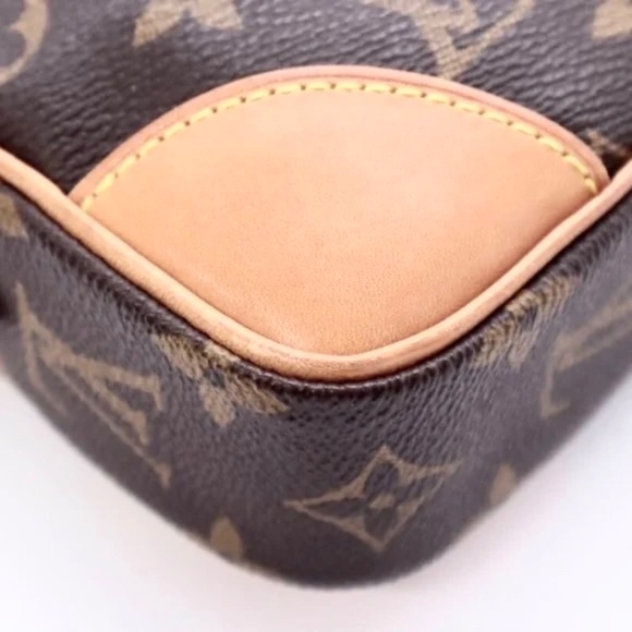 Louis Vuitton Monogram Marly Draggone Clutch - Picture 8 of 13